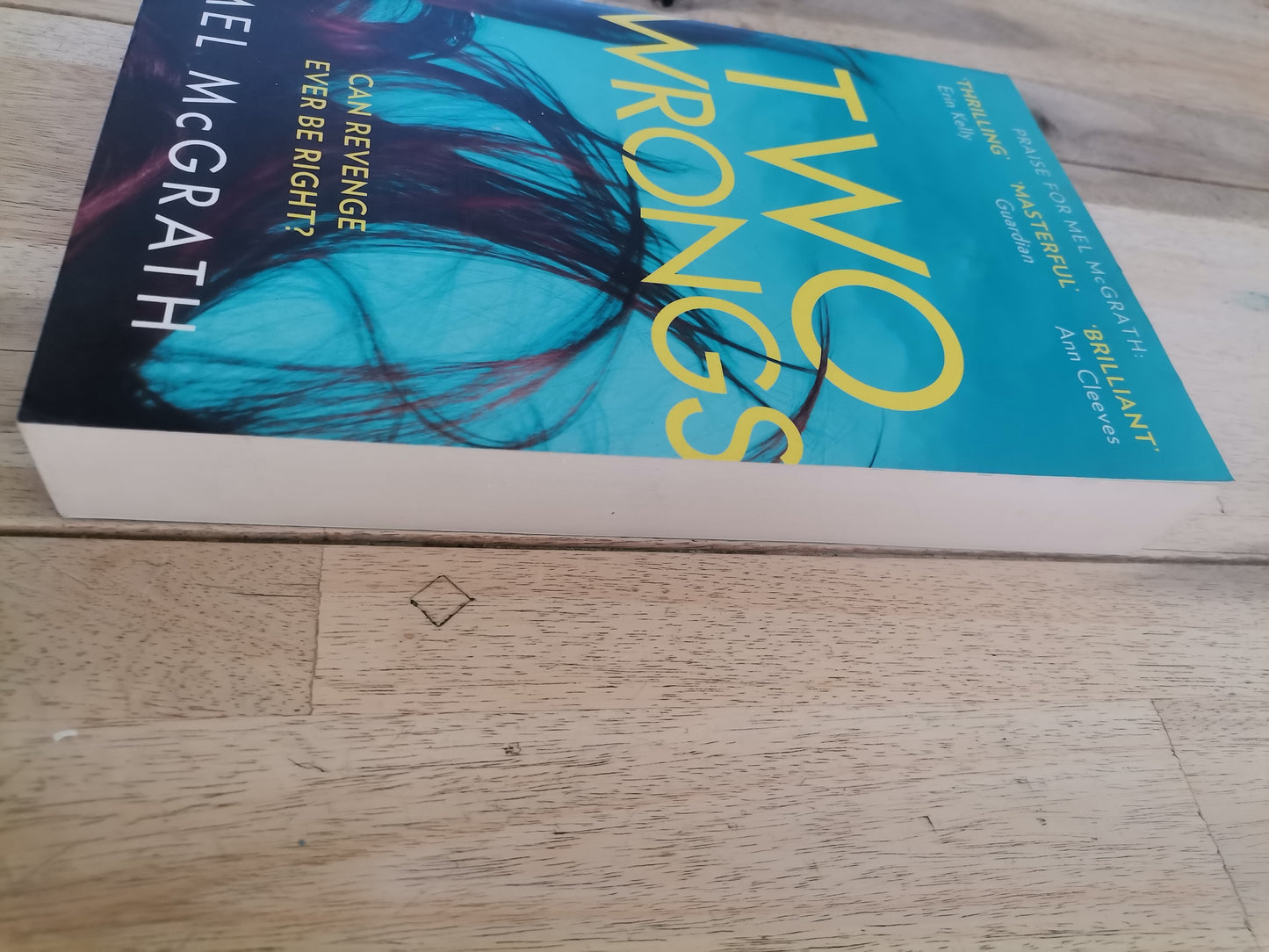 Two wrongs by Mel McGrath