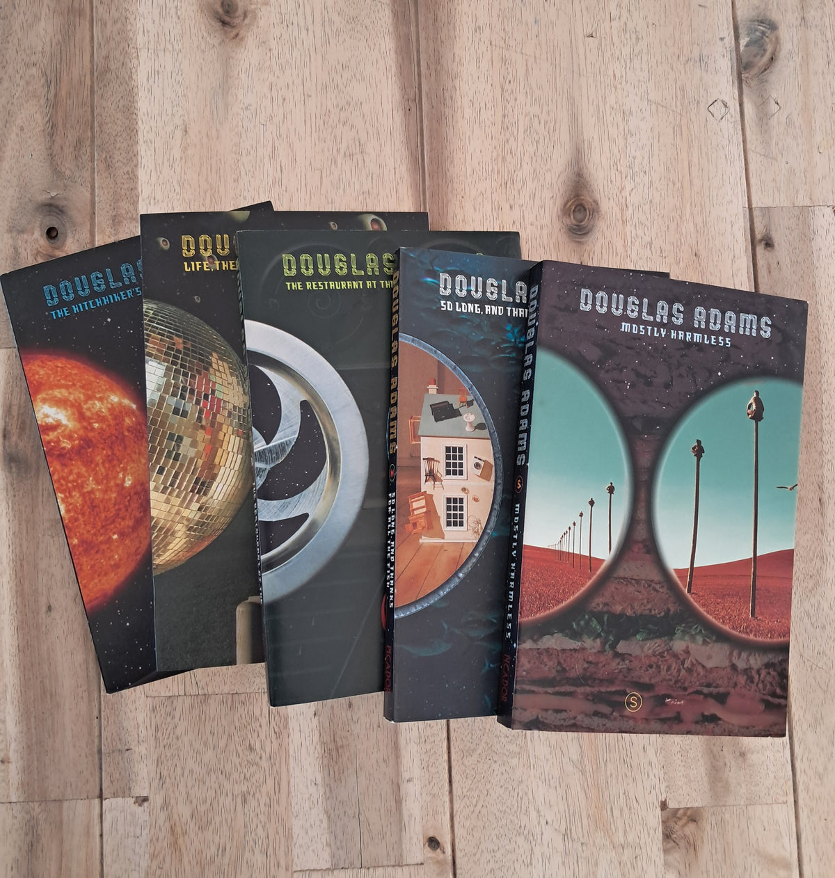 The Hitchhiker’s Guide to the Galaxy: Complete Trilogy in Five-Book Box Set – Douglas Adams