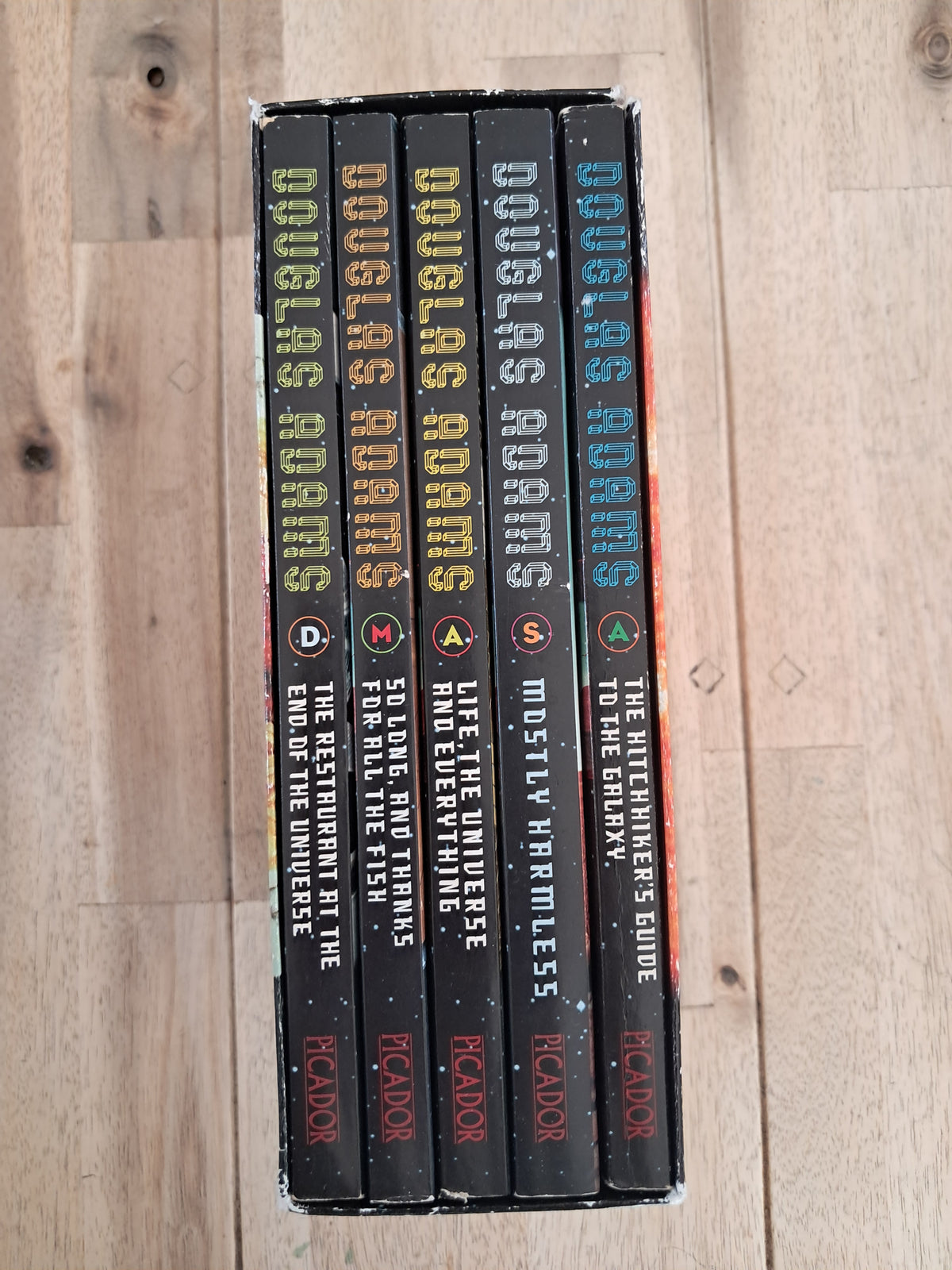 The Hitchhiker’s Guide to the Galaxy: Complete Trilogy in Five-Book Box Set – Douglas Adams