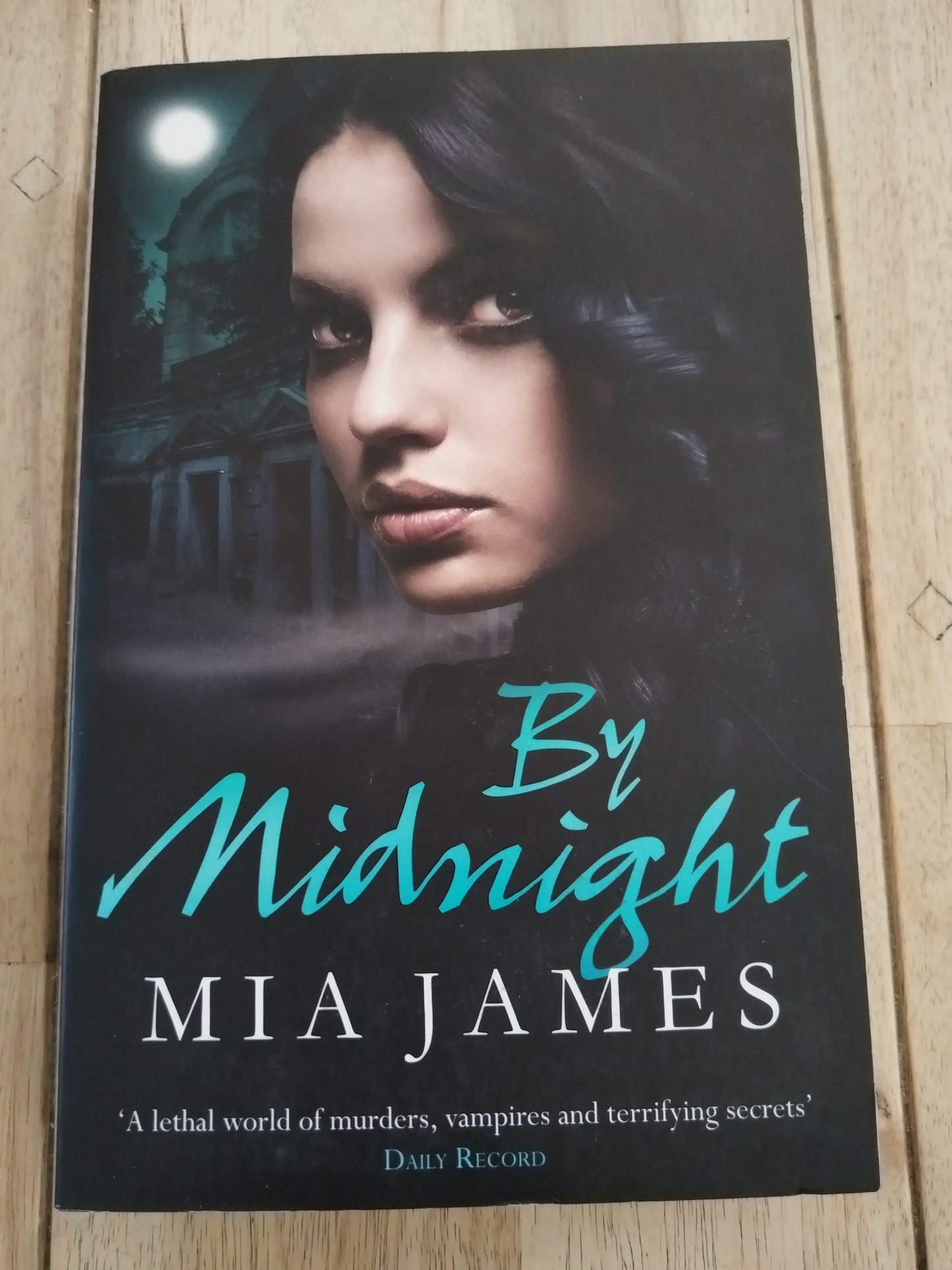 By Midnight Mia James