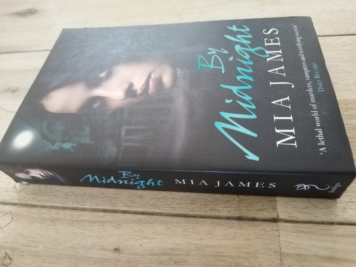 By Midnight Mia James