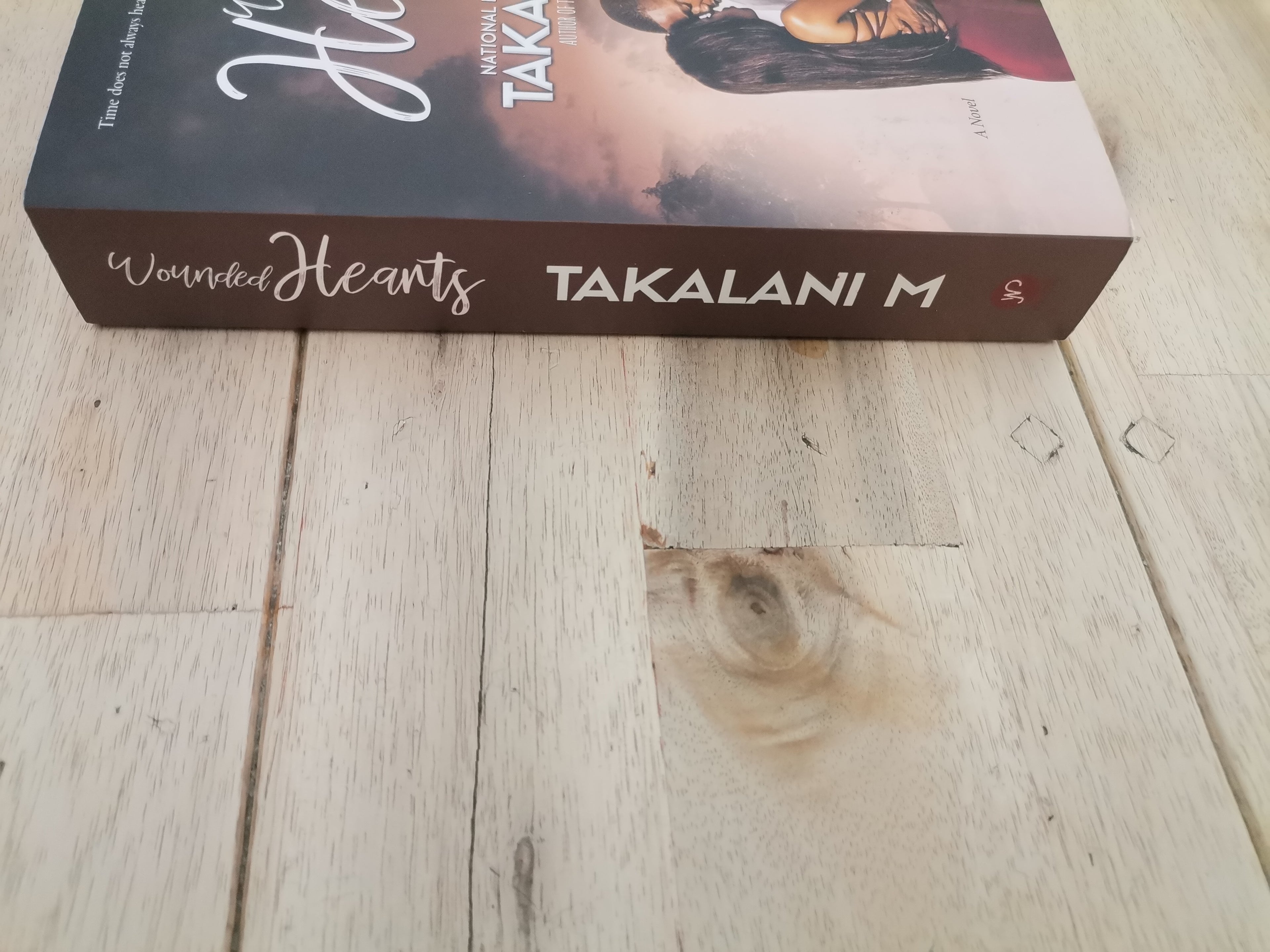 Wounded Hearts by Takalani M
