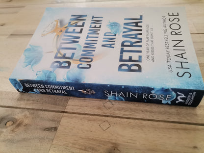Between Commitment and Betrayal by Shaine Rose