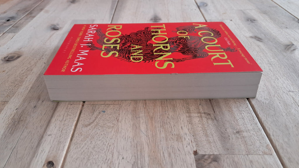 A Court of Thorns and Roses – Sarah J. Maas