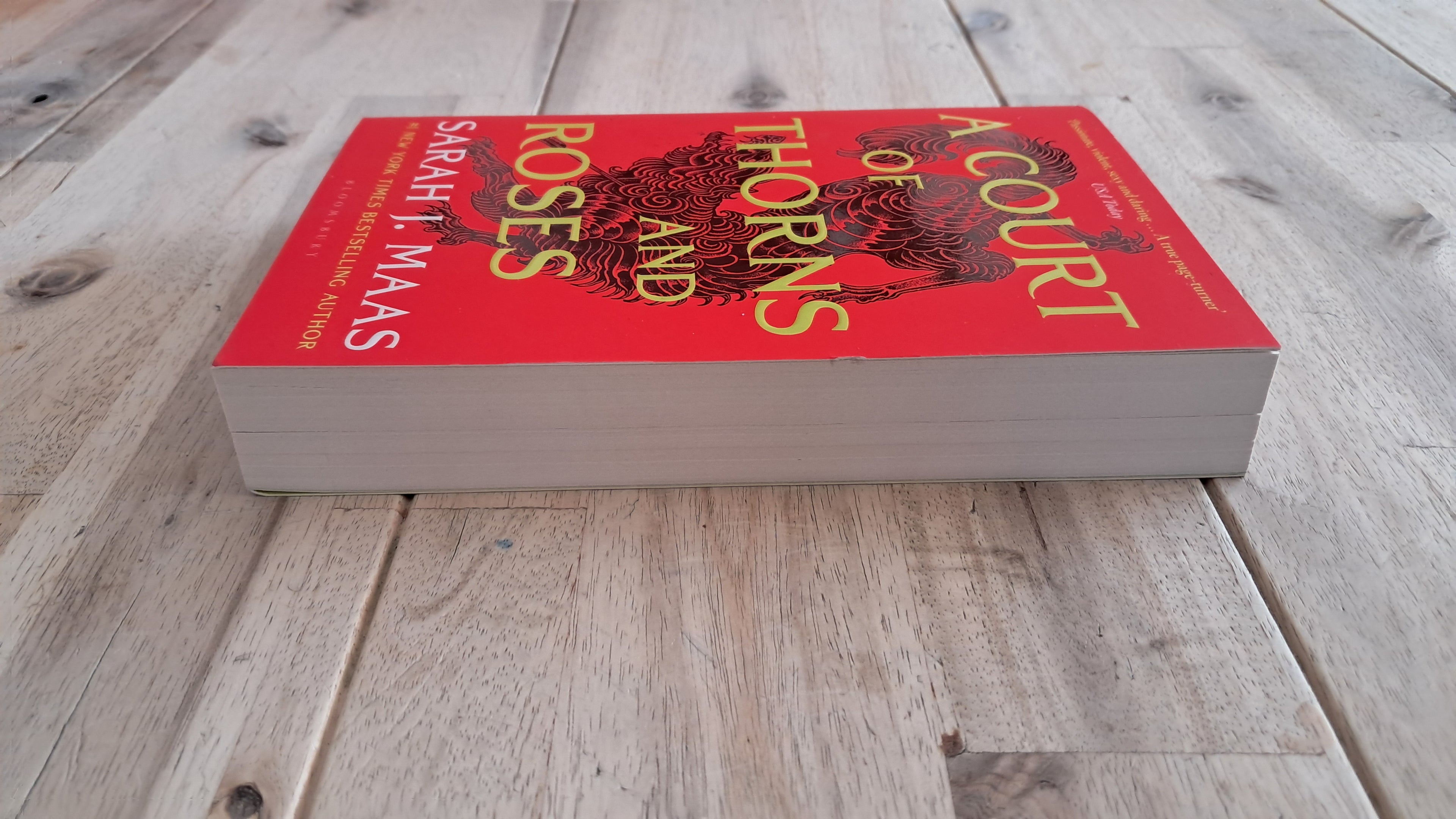 A Court of Thorns and Roses – Sarah J. Maas