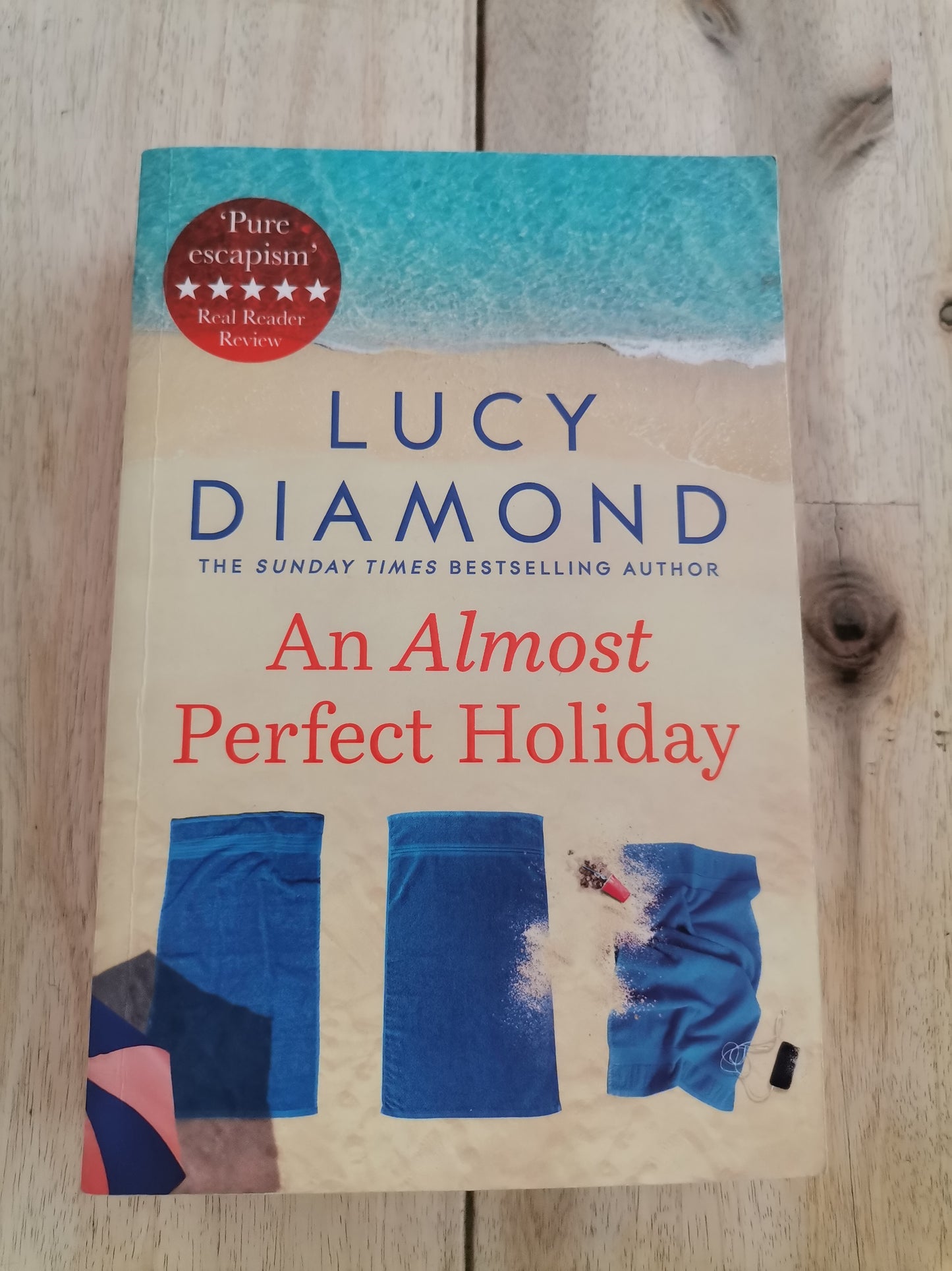 An Almost Perfect Holiday by Lucy Diamond