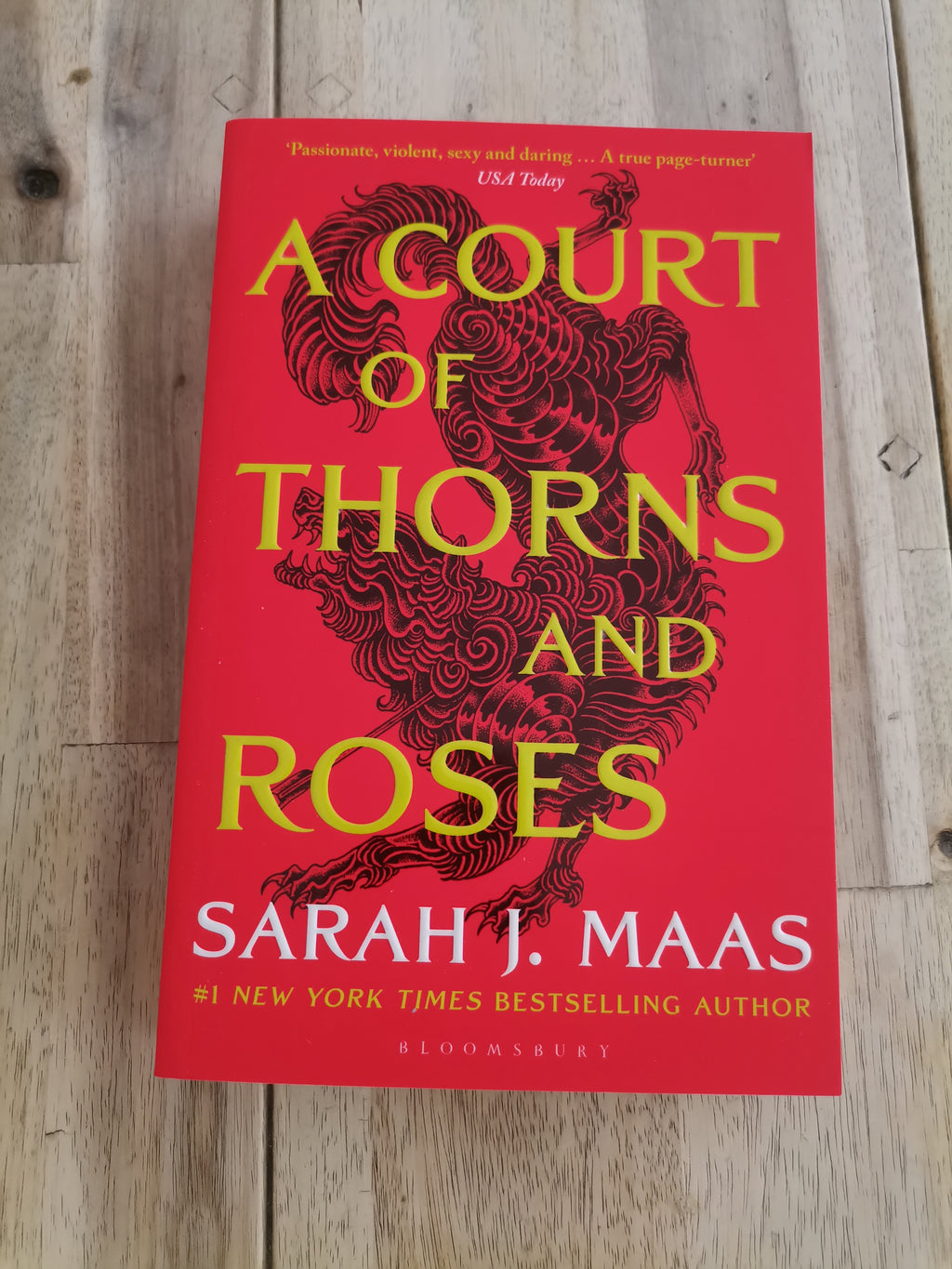 A Court of Thorns and Roses by Sarah J. Maas