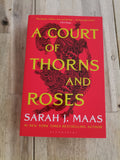 A Court of Thorns and Roses by Sarah J. Maas