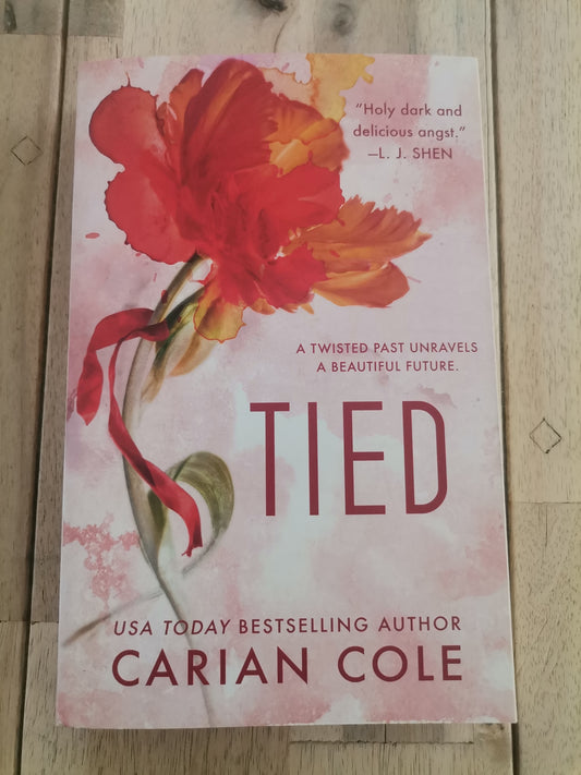 Tied by Carian Cole