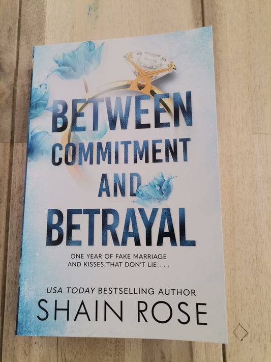 Between Commitment and Betrayal by Shaine Rose