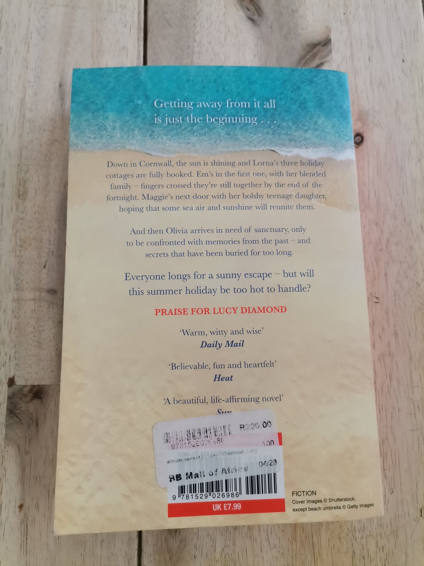 An Almost Perfect Holiday by Lucy Diamond