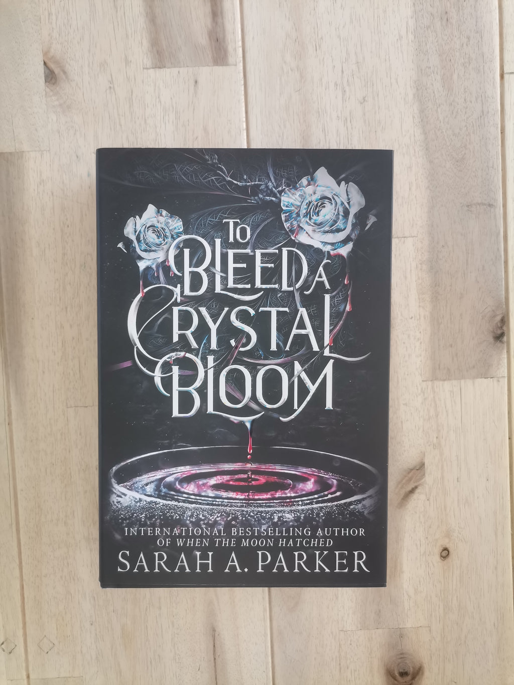 To Bleed a Crystal Bloom – Sarah A. Parker